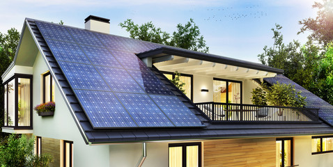 Solar panels on the gable roof of a beautiful modern home - obrazy, fototapety, plakaty