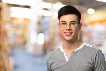 Smiling handsome boy  on  background