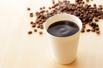 コーヒー　Coffee cup on wooden background
