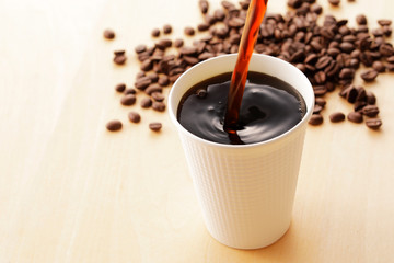 コーヒー　Coffee cup on wooden background