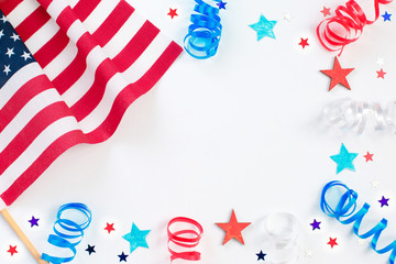 4th of July. Independence day with american confetti, flag and ribbon. celebration, patriotism and holidays concept