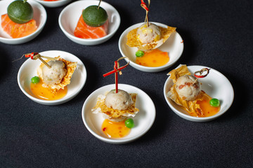 Canapes with smoked salmon, pita, meat balls.