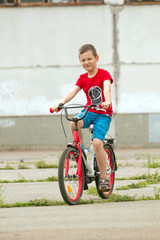 Happy boy ride the bicycle