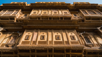 Buildings of intricate carvings in desert town Jaisalmer