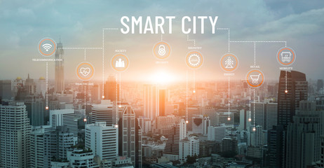 Smart city with smart services and icons, network connection and augmented reality, internet of things, communication, sunset background.