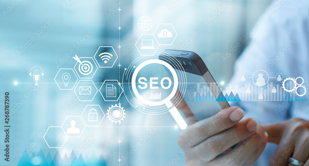 Fototapete seo search engine optimization marketing concept. voice search. businessman using mobile smartphone 