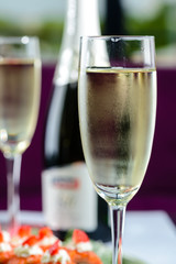 glasses of white sparkling wine champagne lot of close-ups