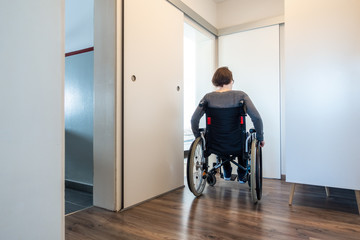 disabled woman in her apartment