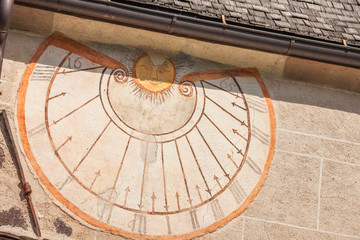 A detail of the old sundial painted on 1465 over the external wall of the little chapel of St. Magdalena in Val di Funes