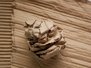 paper ball on wooden background