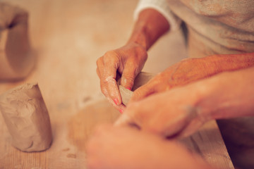 Top view of pleasant creative womans hands