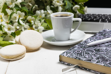 Coffee for Breakfast and lilac flowers. Selective focus