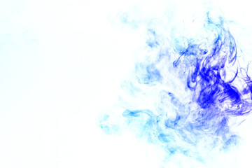 Colorful steam exhaled from the vape with a smooth transition of color molecules from turquoise to...