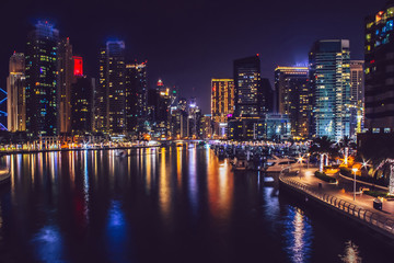 Naklejka na ściany i meble Dubai Marina district at night. Dubai at May 2019