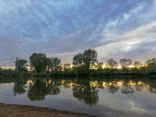 Fototapeta na wymiar sunset on the river