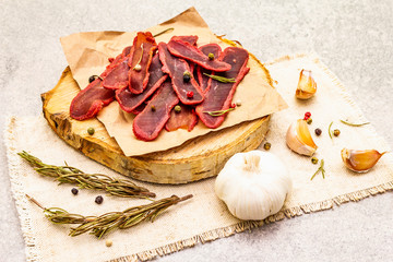 Basturma, dried tenderloin of beef meat, jerky, thinly sliced. Dry rosemary, pepper mix, chili,...