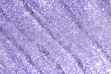 purple bright sand made of metall glitters with selective focus and small bokeh texture - wonderful abstract photo background