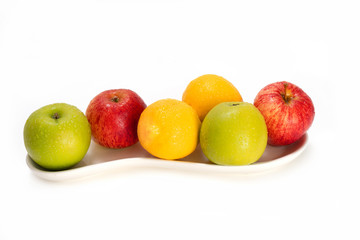 Apples and lemon in white background