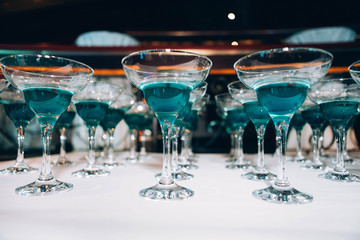 Many glasses of margarita cocktail on the bar. Margarita Cocktail Blue Cocktail