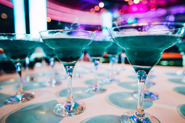 Many glasses of margarita cocktail on the bar. Margarita Cocktail Blue Cocktail