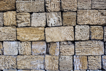 Old stone wall of stones. Textural background