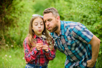 Biggest pollen allergy questions. Father little girl enjoy summertime. Dad and daughter blowing dandelion seeds. Keep allergies from ruining your life. Seasonal allergies concept. Outgrow allergies