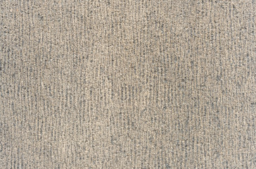 Fototapeta premium Granite texture. Surface of rough granite stone. Stripes stone rock wall. Grey stony granite background.