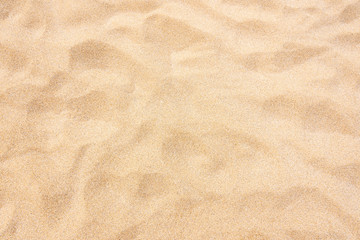 Fototapeta na wymiar Yellow beach sand background