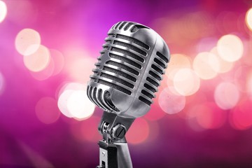 Retro style microphone on  background
