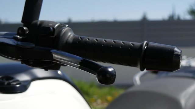 close-up of the gas grip of the motorcycle