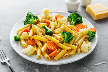 Healthy pasta penne with vegetables on plate