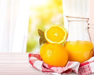 Orange juice and slices of orange on background © BillionPhotos.com