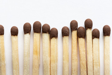 Wooden matches with brown heads