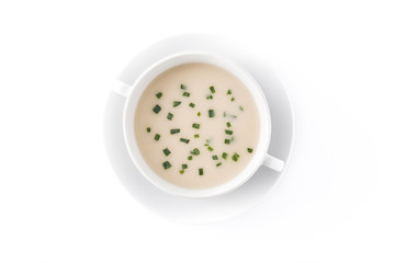 French vichyssoise soup in bowl isolated on white background. Top view