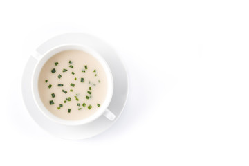 French vichyssoise soup in bowl isolated on white background. Top view. Copyspace