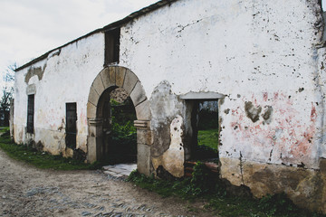 facade of old hospital abandoned in the village of granadilla caceres spain