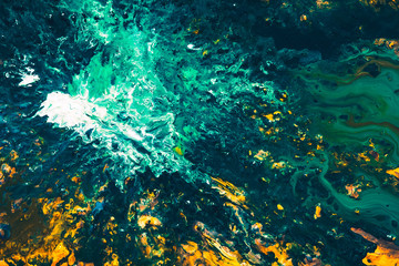 Abstract art texture background. Ocean waves splashing at cliff. Beautiful green and yellow paint...