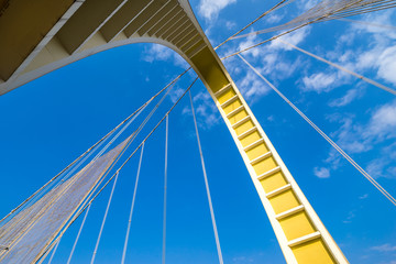 looking up bridge in sky