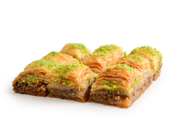 Pistachio baklava on a white background. Dessert.