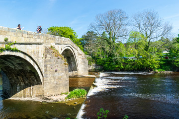 Fototapeta premium old stone bridge over the river