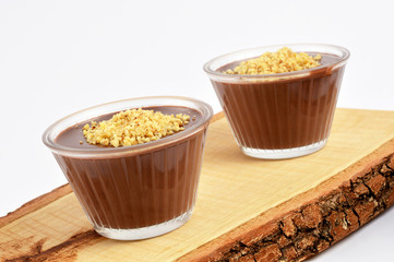 Chocolate puddings on wood plate
