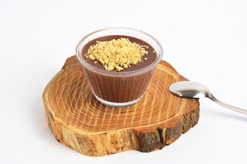 Chocolate pudding on wood plate