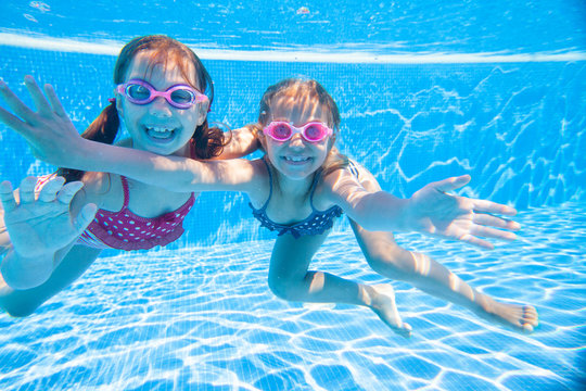 Children swim in  pool