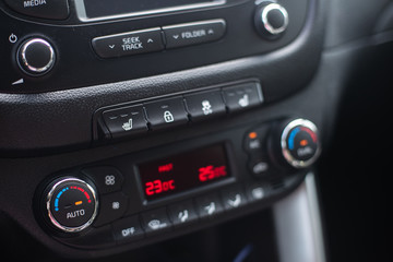 Modern car dashboard. Screen multimedia system. Climate control.