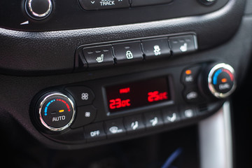 Modern car dashboard. Screen multimedia system. Climate control.