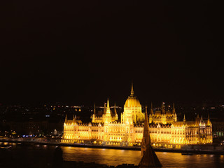 Fototapeta na wymiar Hungarian Parliament Building lit up at night - Budapest, Hungary 