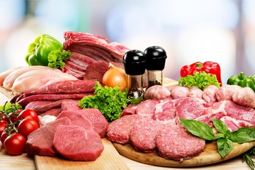 Fresh Raw Meat Background with vegetables