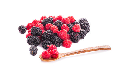 Raspberries and blackberries on white background