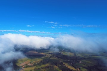 Flying above clouds with a blue sky. Freedom, Inspiration, Peace, Abstract. Great landscape.