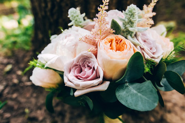 wedding bouquet with peony rose. bouquet with roses, peonies and eucalyptus.